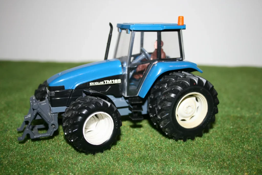 New Holland TM165 jumelées