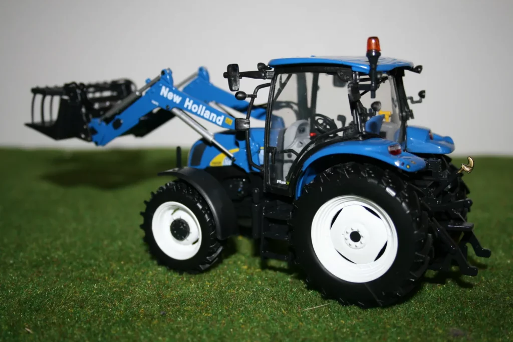 New Holland T6020 chargeur bleu